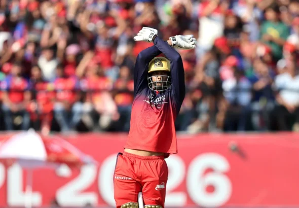 RCB secures playoff qualification with win over Punjab.
